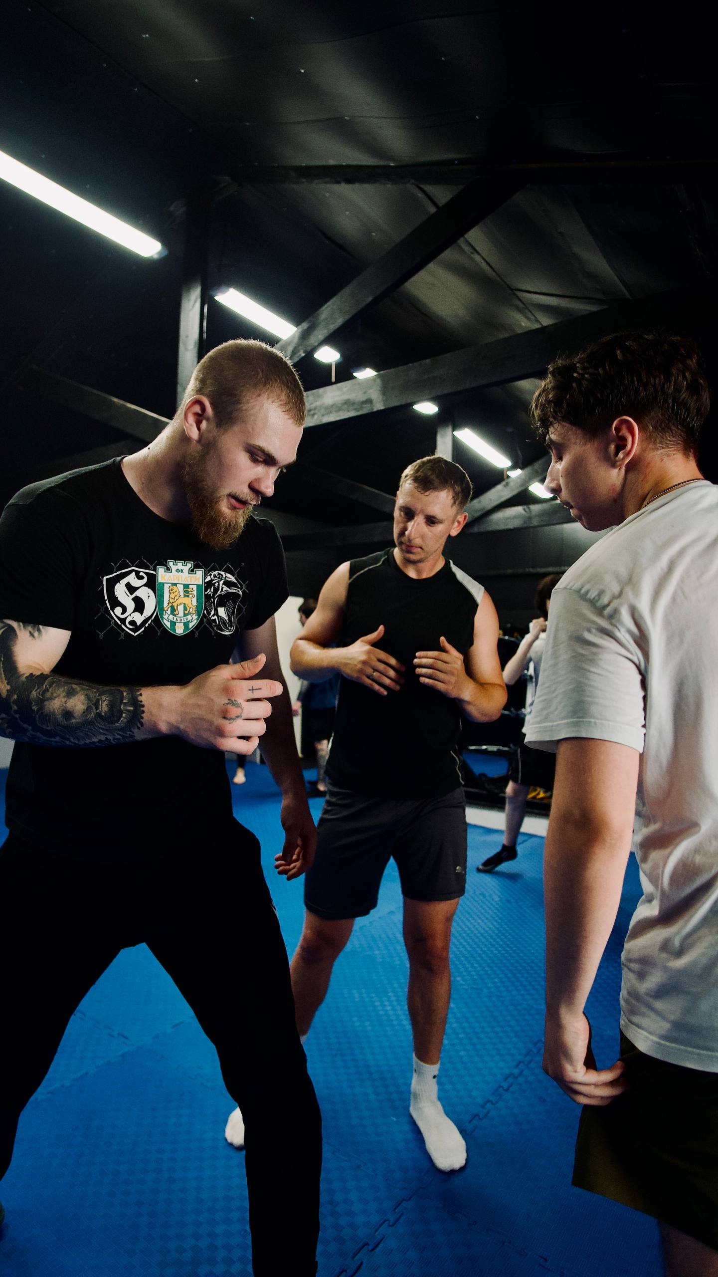 Mark instructing students during a training session