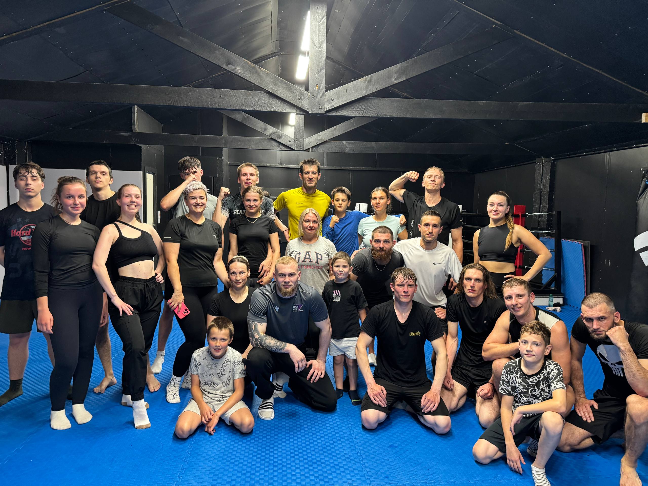 Full team group photo at the gym